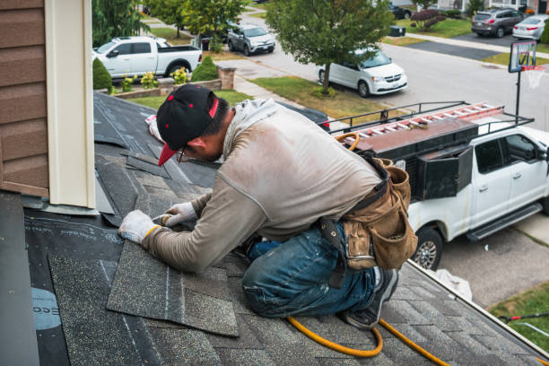 Professional Roofing technician working in Moscow, IA